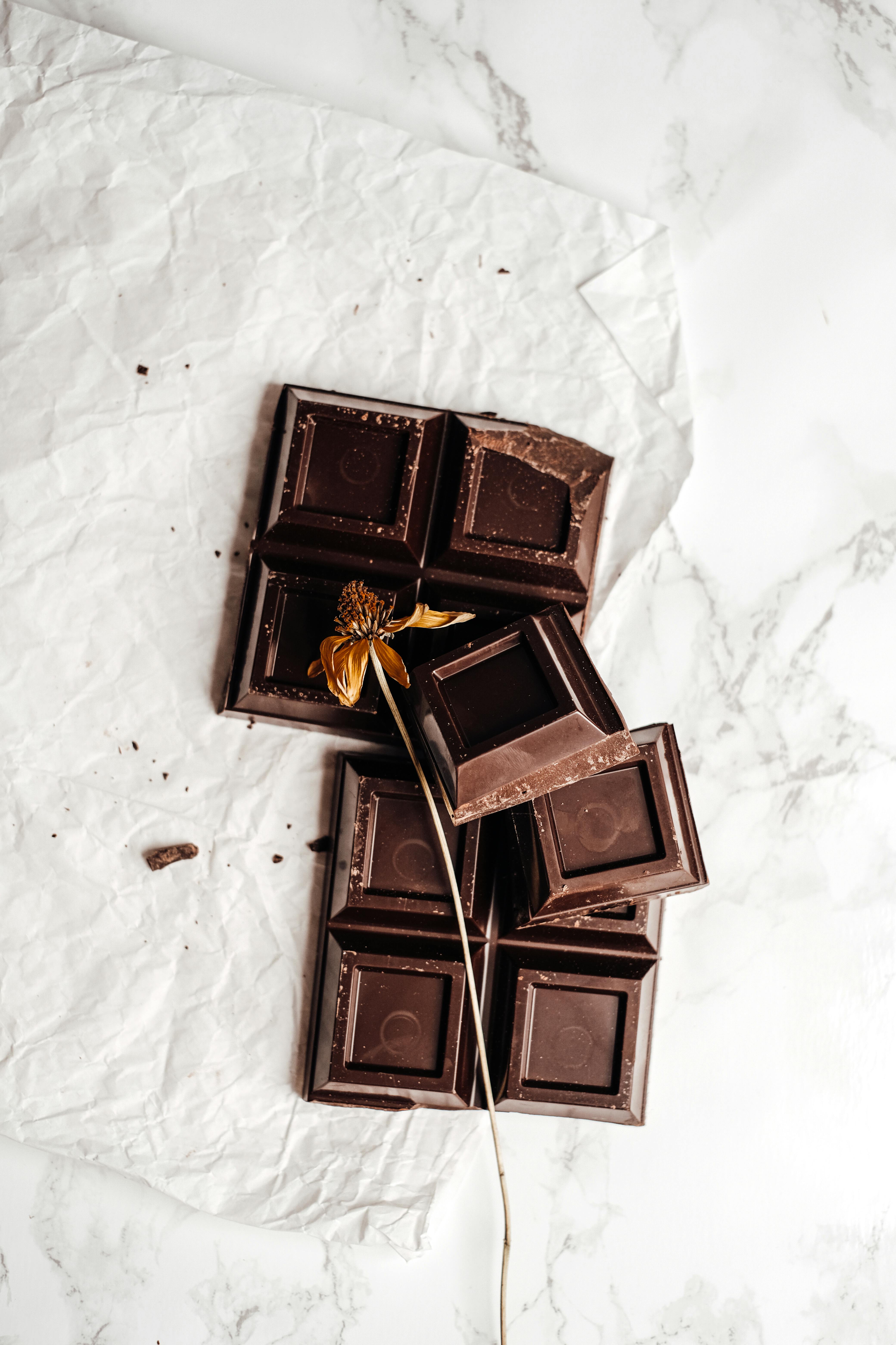 Chocolate with a dried flower on top, showing the artisan side of chocolate-making